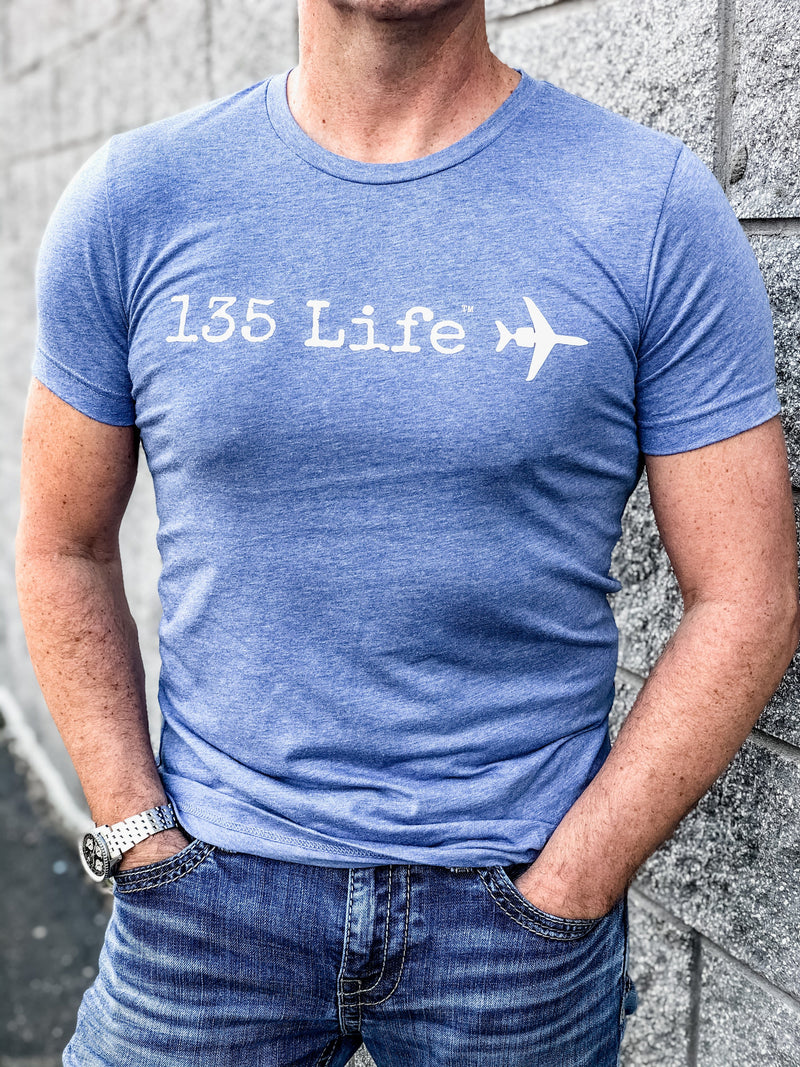 pilot wearing part 135 t-shirt in blue