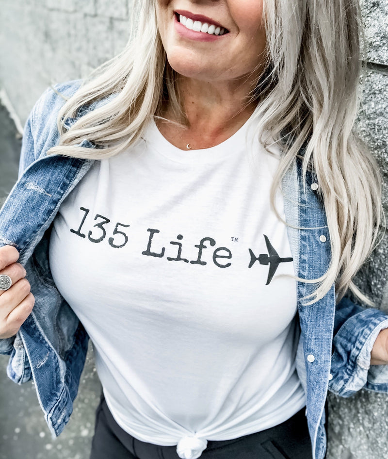 blonde flight attendant wearing part 135 t-shirt
