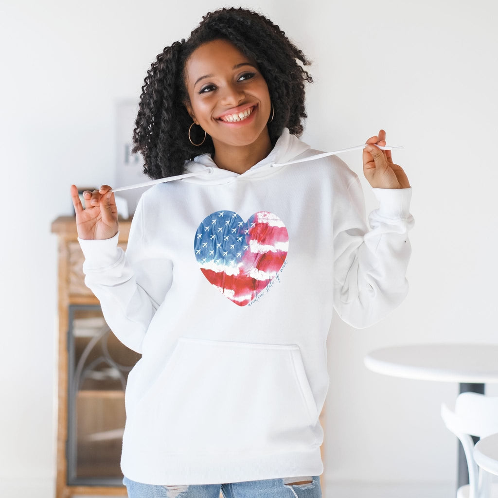 flight attendant wearing white hoodie with American flag and airplanes