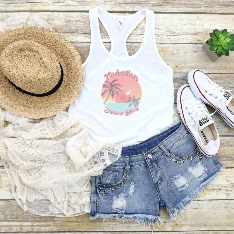 straw hat w white tank w airplane sunset w converse sneakers